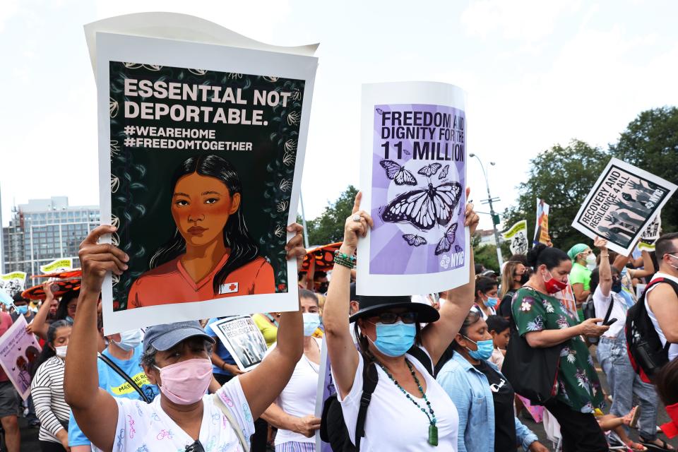 People march in support of a pathway to citizenship for immigrants in New York City in 2021.