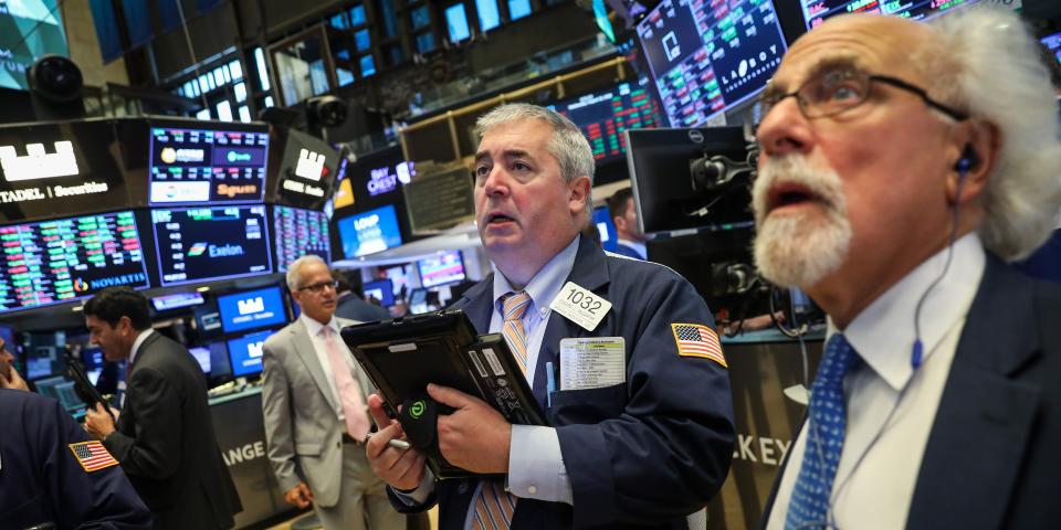 Stock traders on the stock market trading floor.