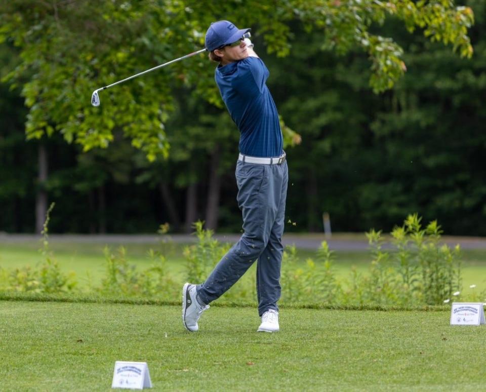 Portsmouth's Chris Kelloway follows the flight of his drive during the opening round of Thursday's New Hampshire Open at Breakfast Hill Golf Club in Greenland.