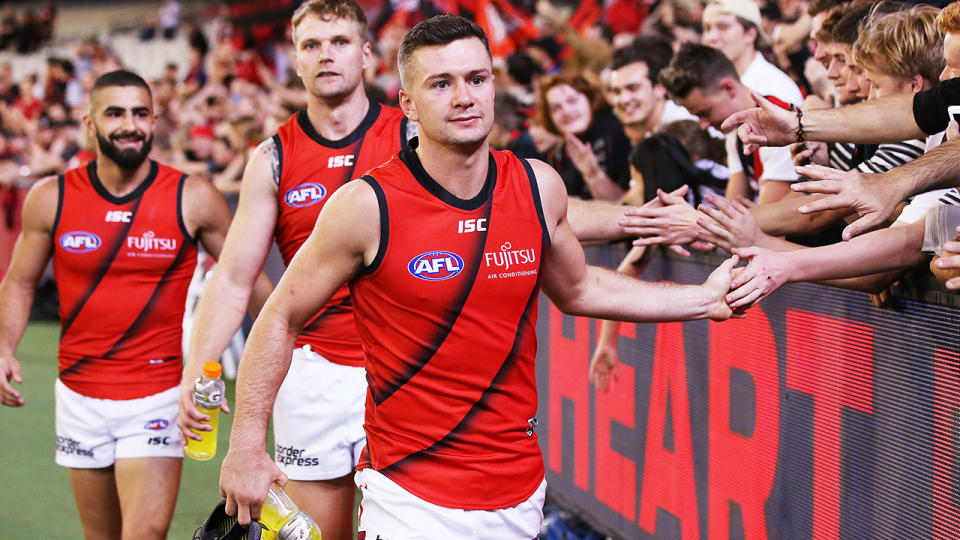 Conor McKenna, pictured here celebrating after an Essendon win in 2019.