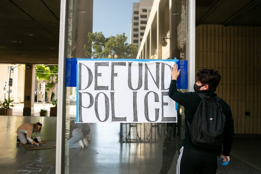 Protesters gathered outside San Diego City Hall to draw 140 chalk outline, representing the 140,000 low-income residents they say are at risk of eviction if their budget demands aren't listened to on June 8, 2020 in San Diego, California. The action came just hours before the City Council was considering Mayor Kevin Faulconer's proposed budget. The advocates asked that some San Diego Police Department funding be diverted to a rental assistance program.