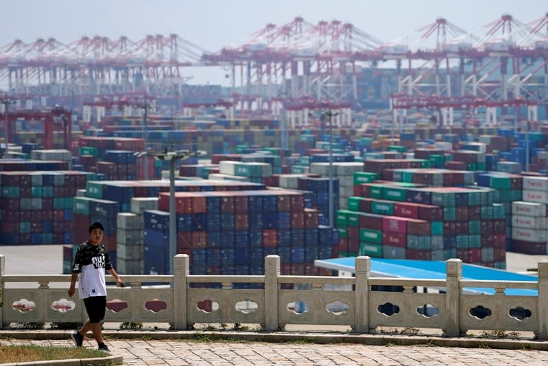 Containers are seen at the Yangshan Deep Water Port in Shanghai