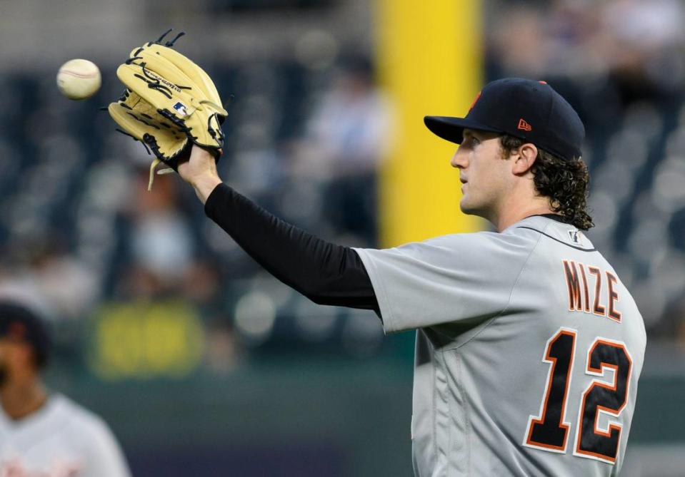 Detroit Tigers starting pitcher Casey Mize catches the ball from one of his teammates after a strikeout during the fifth inning of a baseball game against the Kansas City Royals in Kansas City, Mo., Tuesday, June 15, 2021. (AP Photo/Reed Hoffmann)