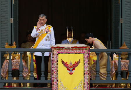 Thailand's newly crowned King Maha Vajiralongkorn is seen at the balcony of Suddhaisavarya Prasad Hall at the Grand Palace where he grants a public audience to receive the good wishes of the people in Bangkok, Thailand May 6, 2019.REUTERS/Jorge Silva