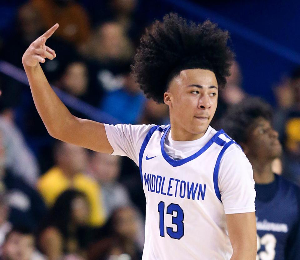 Middeltown's Jaiden McGhee celebrates a basket in the first half of a DIAA state tournament semifinal against Salesianum at the Bob Carpenter Center, Thursday, March 9, 2023.