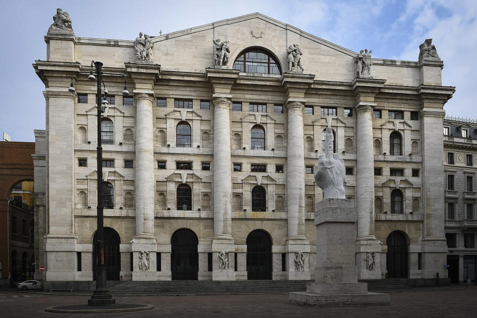 MILAN, ITALY - March 29, 2020: General view shows almost deserted piazza Affari ('Business Square'). In the background there is Palazzo Mezzanotte, the headquarter of Borsa Italiana, while in the foreground stands the statue L.O.V.E., also known as Il Dito ('The Finger'), by Italian contemporary artist Maurizio Cattelan. The Italian government imposed unprecedented restrictions to halt the spread of COVID-19 coronavirus outbreak, among other measures people movements are allowed only for work, for buying essential goods and for health reasons. (Photo by Nicol� Campo/Sipa USA)