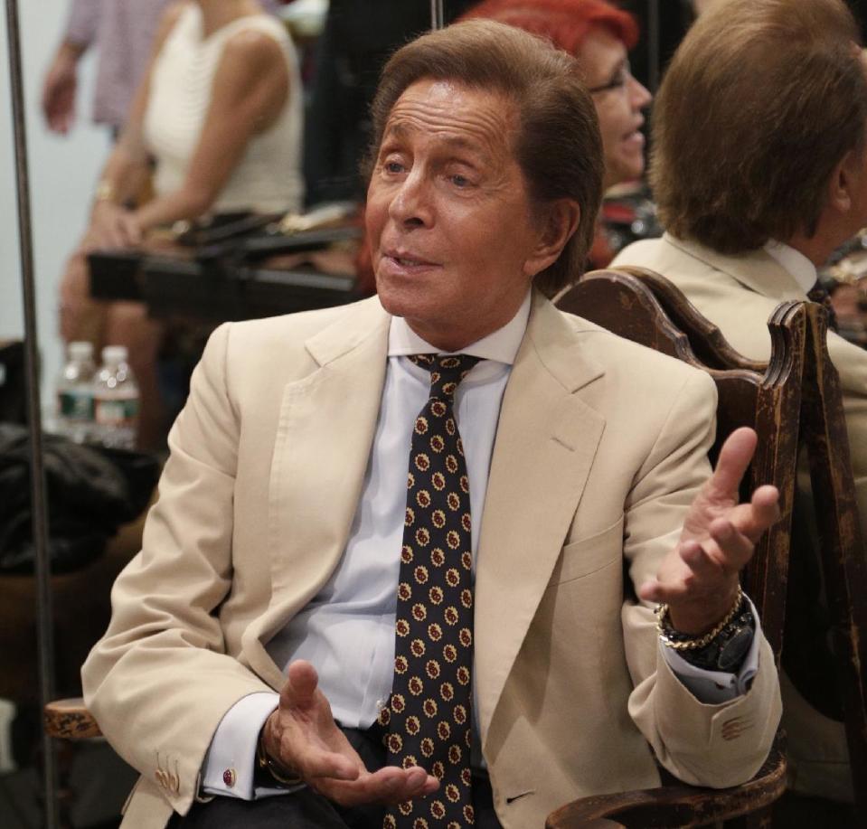 This Sept. 12, 2012 photo released by the New York City Ballet shows designer Valentino Garavani in New York. Valentino, 80, says he is a great fan of the ballet, and he has found designing ballet costumes has been inspiring. (AP Photo/New York City Ballet, Paul Kolnik)