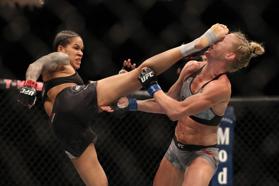 LAS VEGAS, NV - JULY 06: Amanda Nunes of Brazil kicks Holly Holm in their UFC bantamweight championship fight during the UFC 239 event at T-Mobile Arena on July 6, 2019 in Las Vegas, Nevada.  (Photo by Christian Petersen/Zuffa LLC/Zuffa LLC)