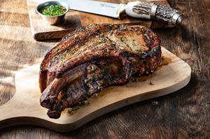 The Double Bone-In Pork Chop is a premium cut marinated for 48 hours with roasted garlic, fresh herbs and lime zest, before being slowly roasted on the bone for maximum flavor. Fogo.com