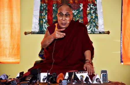 Tibetan spiritual leader Dalai Lama speaks at a press conference after delivering teachings at Yiga Choezin, in Tawang, in the northeastern state of Arunachal Pradesh, India April 8, 2017. REUTERS/Anuwar Hazarika