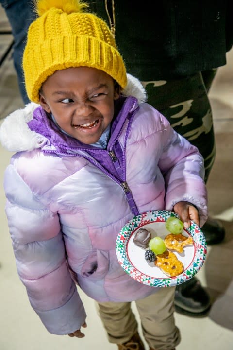 The Angel Tree Christmas Party at Talsma Furniture near Grand Rapids on Nov. 30, 2023. (Michael Buck/WOOD TV8)