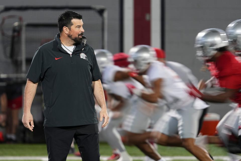 Mar 7, 2024; Columbus, OH, USA; Ohio State Buckeyes head coach Ryan Day watches players run during spring football practice at the Woody Hayes Athletic Center.