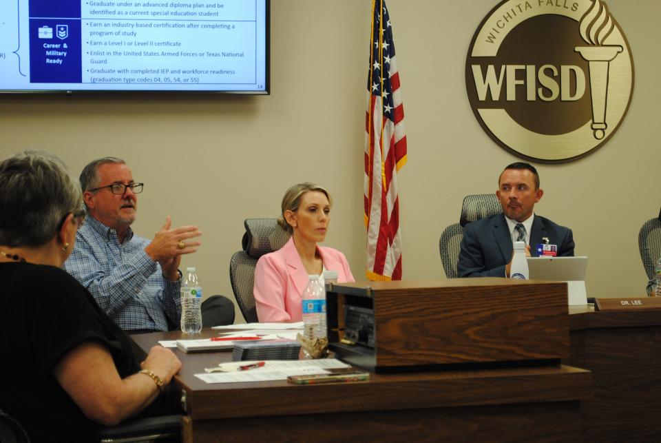 WFISD board of trustee Jim Johnson, left, comments during a presentation Tuesday afternoon about proposed changes to the public school accountability ratings.