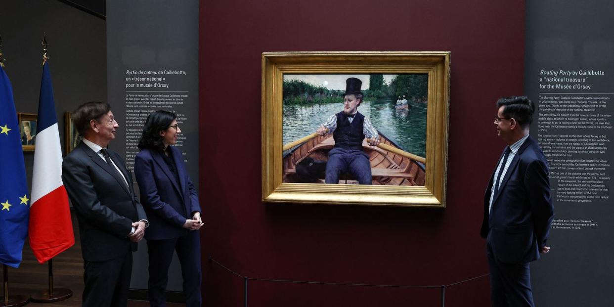 from l advisor to bernard arnault, president of lvmh, jean paul claverie, french culture minister rima abdul malak and musee dorsays president christophe leribault look at the painting la partie de bateau by gustave caillebotte, classified as national treasure which has just joined the musee dorsay in paris on january 30, 2023 restricted to editorial use mandatory mention of the artist upon publication to illustrate the event as specified in the caption photo by anne christine poujoulat afp restricted to editorial use mandatory mention of the artist upon publication to illustrate the event as specified in the caption restricted to editorial use mandatory mention of the artist upon publication to illustrate the event as specified in the caption photo by anne christine poujoulatafp via getty images