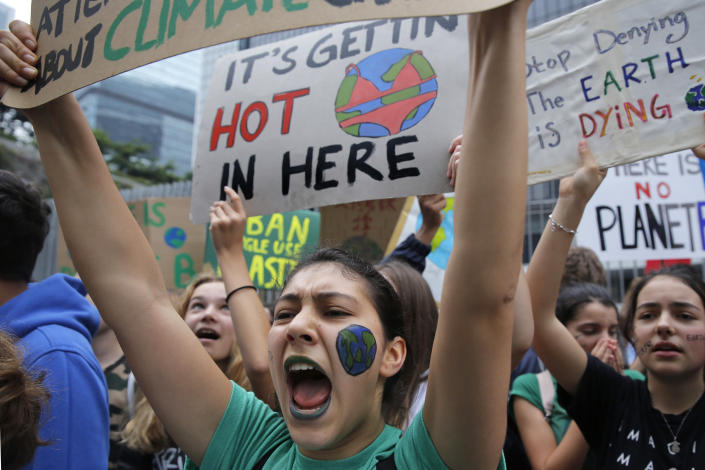Hundreds of schoolchildren take part in a climate protest in Hong Kong, Friday, March 15, 2019. Students in more than 80 countries and territories worldwide plan to skip class Friday in protest over their governments' failure to act against global warming. The coordinated 'school strike' was inspired by 16-year-old activist Greta Thunberg, who began holding solitary demonstrations outside the Swedish parliament last year. (AP Photo/Kin Cheung)