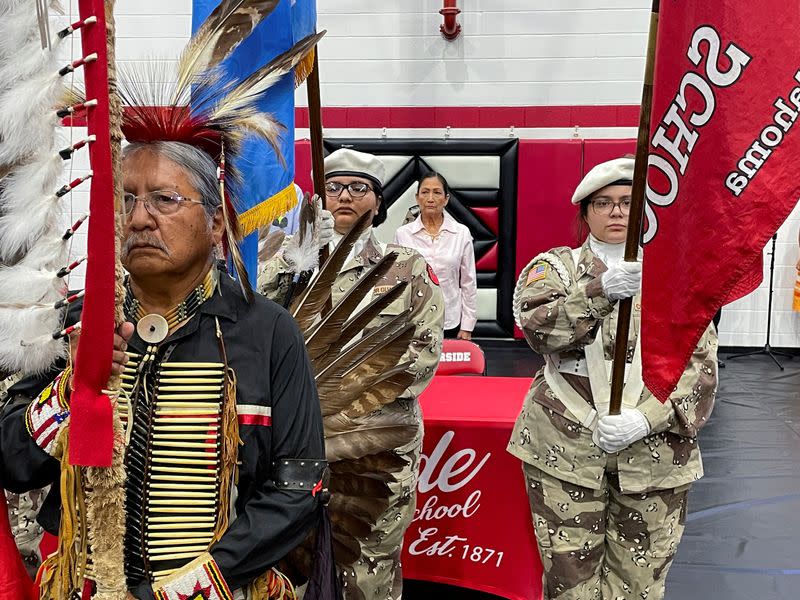 FILE PHOTO: U.S. Interior Secretary Deb Haaland stands behind a Native American color guard ahead of an event in Anadarko, Oklahoma