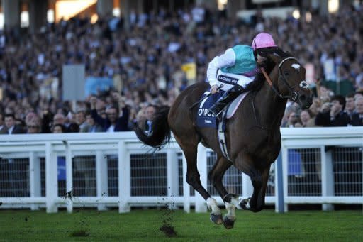 File photo shows Tom Queally riding Frankel (R) to win the Queen Elizabeth II Stakes at Ascot racecourse in October 2011. Frankel will to extend his unbeaten sequence to 11 in the Queen Anne Stakes over 1,600 metres on Tuesday