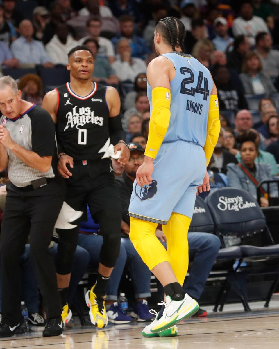 The Memphis Grizzlies forward Dillon Brooks (24) exchanges words with the Los Angeles Clippers guard Russell Westbrook (0) at the FedEx Forum on March 29, 2023 in Memphis.