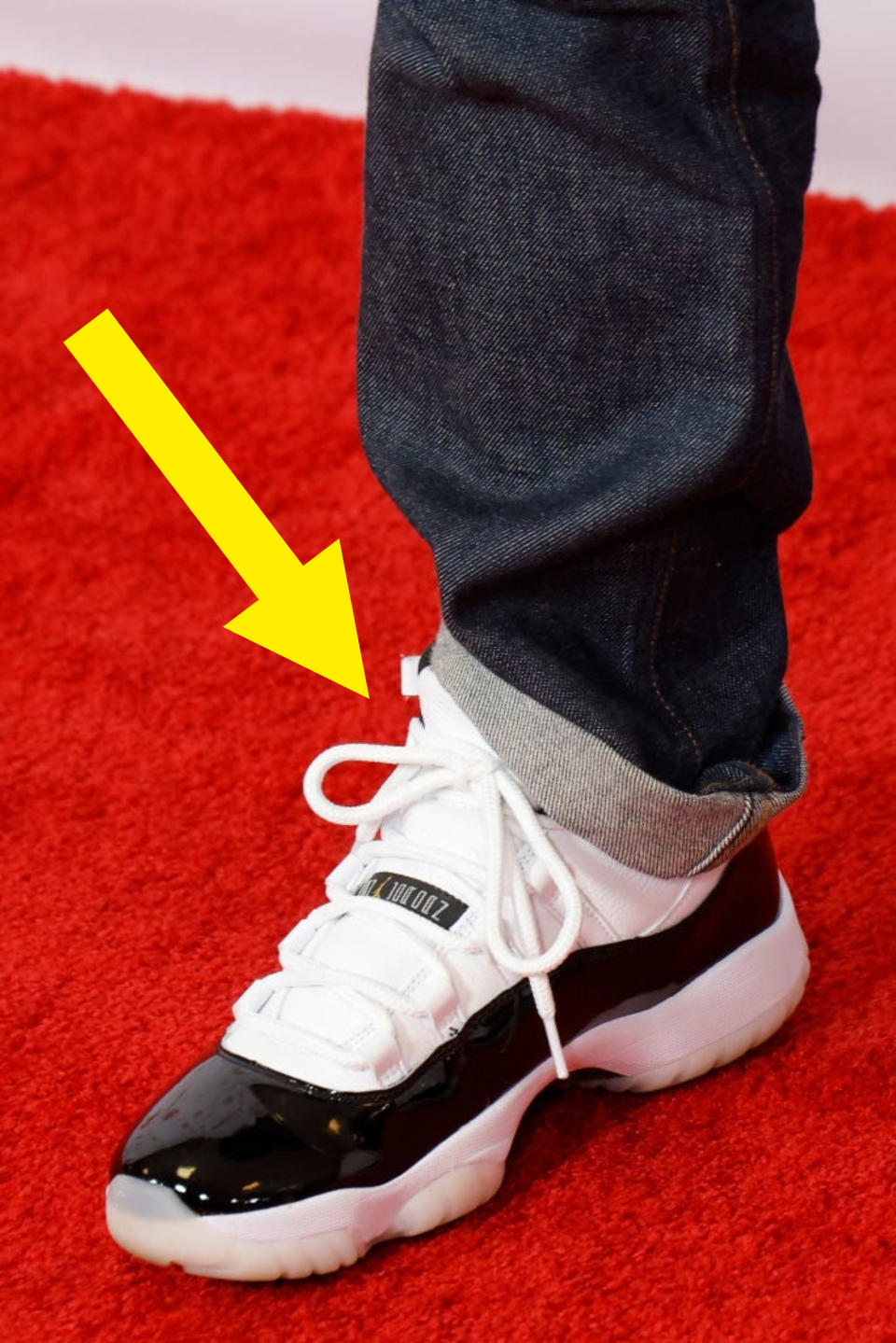 Closeup of Andy Cohen's jeans and shoes