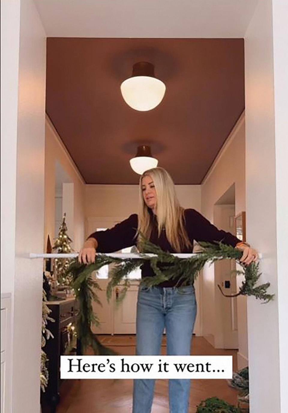 PHOTO: Ashley Stringfellow, founder of Modern Glam, tried the viral garland shower rod hack. (@modernglamhome/Instagram)