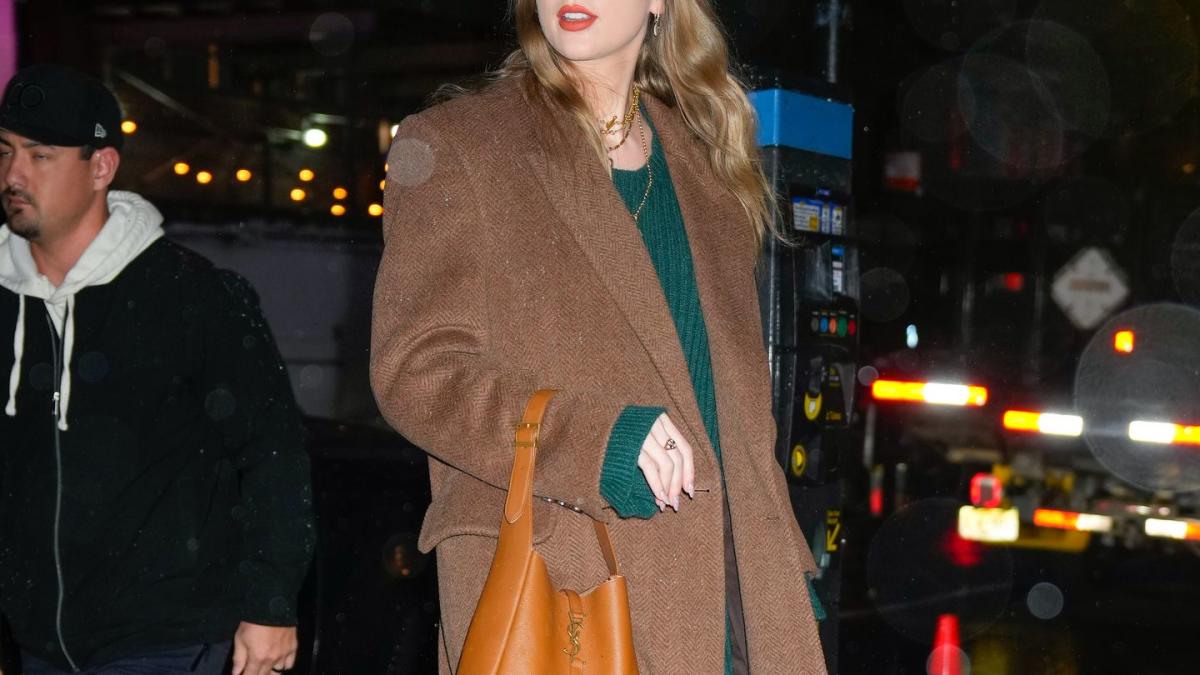 Taylor Swift Kept Warm in a $2,345 Hooded Sweater Dress: Get the Look
