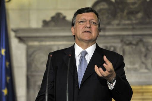 European Commission President Jose Manuel Barroso addresses the media in Athens. Greece must deliver on its obligations if it wishes to remain in the eurozone, Barroso said on his first visit to Athens since the crisis began