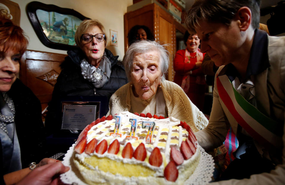 <p>Emma Morano, thought to be the world’s oldest person and the last to be born in the 1800s, blows candles during her 117th birthday in Verbania, northern Italy November 29, 2016. (Alessandro Garofalo/Reuters) </p>