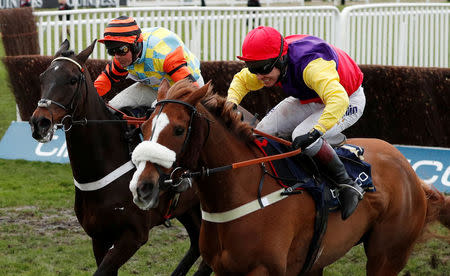 Horse Racing - Cheltenham Festival - Cheltenham Racecourse, Cheltenham, Britain - March 16, 2018 Native River ridden by Richard Johnson in action before winning the 15.30 Timico Cheltenham Gold Cup Chase Action Images via Reuters/Andrew Boyers