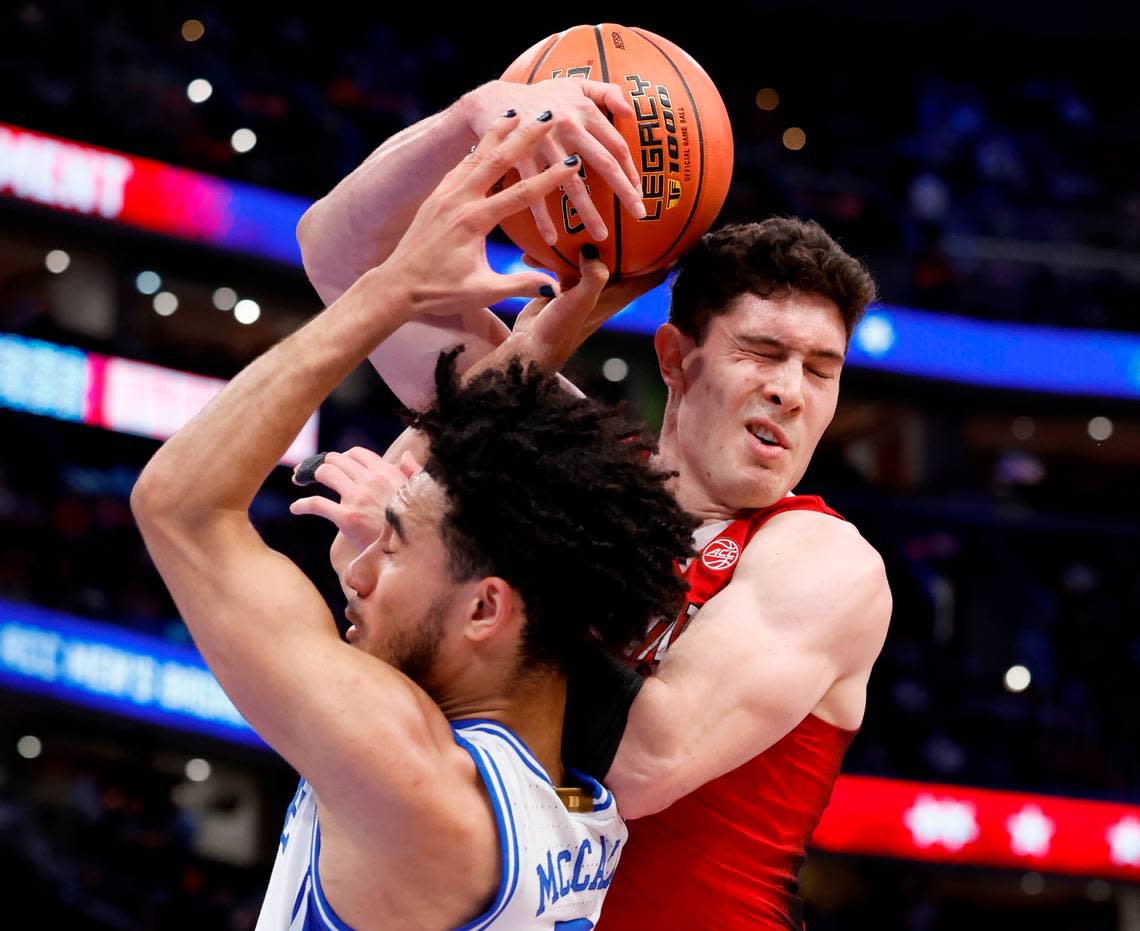 N.C. State’s Michael O’Connell (12) is fouled by Duke’s Jared McCain (0) during the first half of N.C. State’s game against Duke in the quarterfinal round of the 2024 ACC Men’s Basketball Tournament at Capital One Arena in Washington, D.C., Thursday, March 14, 2024.