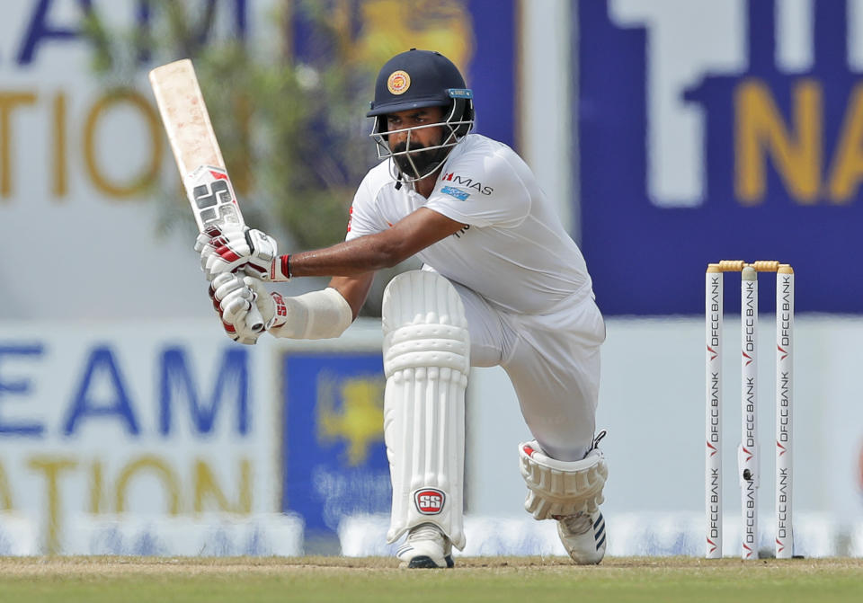 Sri Lankan's Lahiru Thirimanne plays a shot during the day five of the first test cricket match between Sri Lanka and New Zealand in Galle, Sri Lanka, Sunday, Aug. 18, 2019. (AP Photo/Eranga Jayawardena)