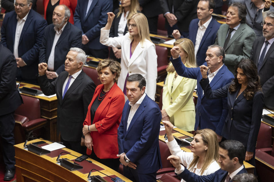 SYRIZA-Progressive Alliance leader Alexis Tsipras, center, attends a swearing in ceremony at the parliament in Athens, Greece, Sunday, May 28, 2023. Newly elected Greek lawmakers were sworn in Sunday, but the Parliament elected on May 21 could be dissolved as early as Monday and a new election campaign start for another election, on June 25. (AP Photo/Yorgos Karahalis)