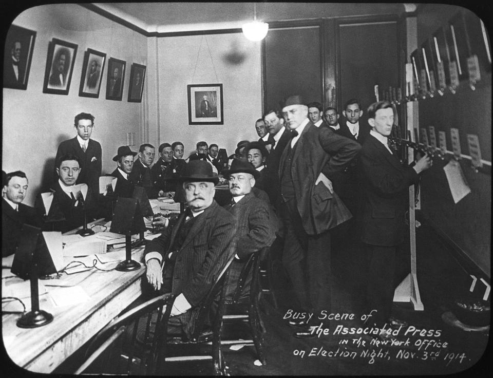 Workers crowd a room in the offices of The Associated Press in New York City on election night, Nov. 3, 1914. (AP Photo)