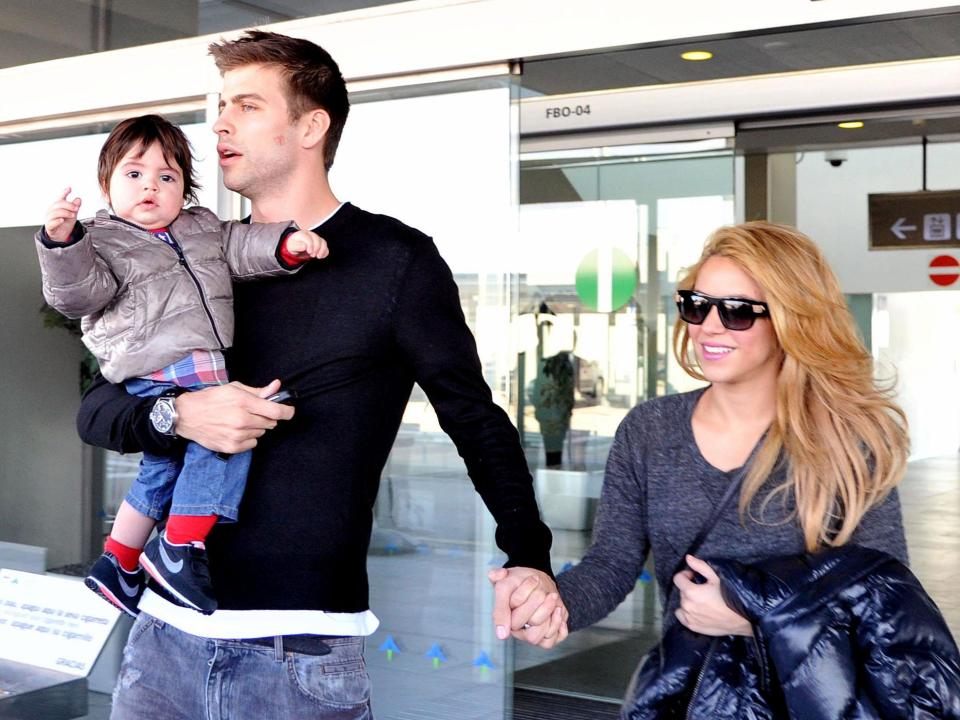 Gerard Pique and his son Milan Pique are seen picking up Shakira in her arrival at El Prat Airport on December 12, 2013 in El Prat de Llobregat, Spain.