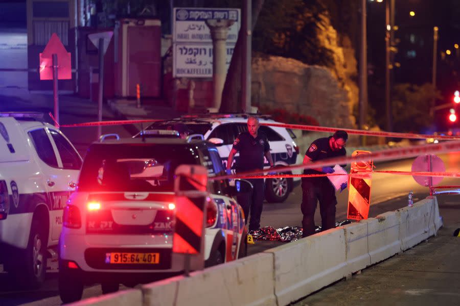 Israeli security forces examine the area of a reported shooting in Jerusalem on October 12, 2023. Two officers were wounded Thursday in a shooting in Israeli-annexed east Jerusalem, police said, adding the gunman was “neutralised”. (Photo by AHMAD GHARABLI / AFP) (Photo by AHMAD GHARABLI/AFP via Getty Images)