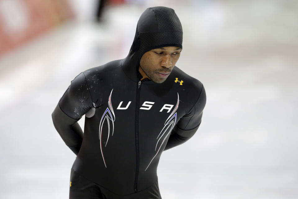 Speedskater Shani Davis of the U.S. trains at the Adler Arena Skating Center during the 2014 Winter Olympics in Sochi, Russia, Friday, Feb. 7, 2014. (AP Photo/Matt Dunham)