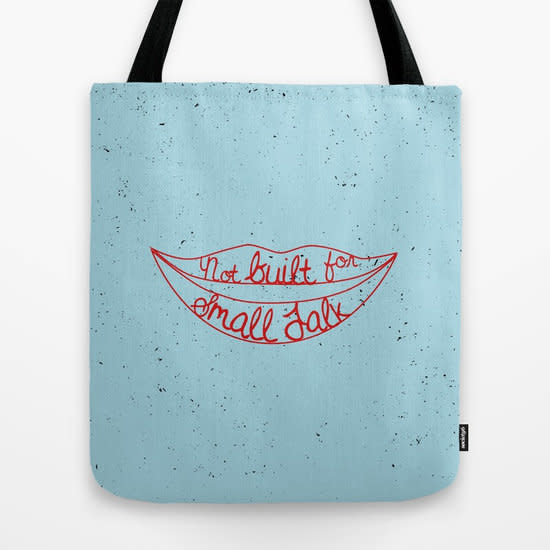 <a href="https://society6.com/product/not-built-for-small-talk_bag?utm_source=google&amp;utm_medium=cpc&amp;utm_campaign=1027&amp;c_kid=3199191p2926197&amp;gclid=Cj0KCQjwoZTNBRCWARIsAOMZHmHfqiP8tZoYBQTGgtvrxfQ1NkK-8uM2yeFo5Eh-oo1VA_yZfse9dkMaAlH5EALw_wcB#26=197&amp;adpos=1o1&amp;creative=102421904086&amp;device=c&amp;matchtype=&amp;network=g" target="_blank">Shop it here</a>.&nbsp;