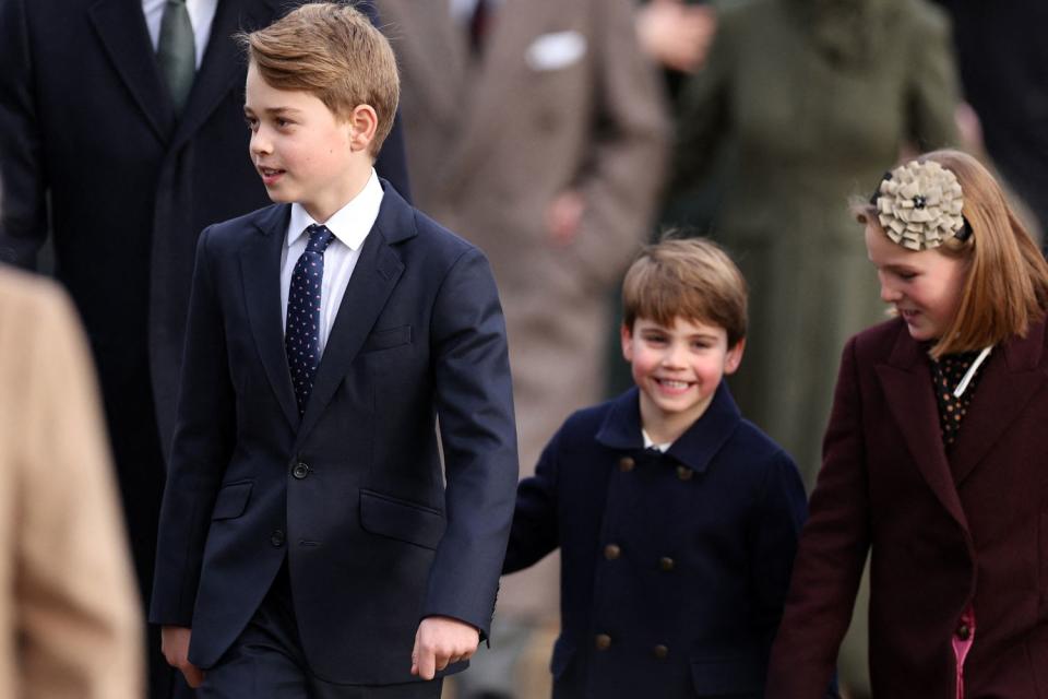 <p>ADRIAN DENNIS/AFP via Getty</p> Prince George, Prince Louis and Mia Tindall on Christmas 2023