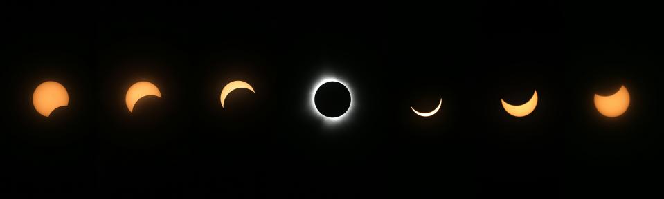 A composite of photos taken before and after totality over Lake Placid, New York April 8, 2024.