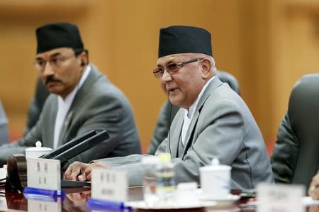 Nepal Prime Minister Khadga Prasad Sharma Oli meets Chinese Premier Li Keqiang (not pictured) after a welcoming ceremony at the Great Hall of the People in Beijing, China March 21, 2016. REUTERS/Lintao Zhang/Pool