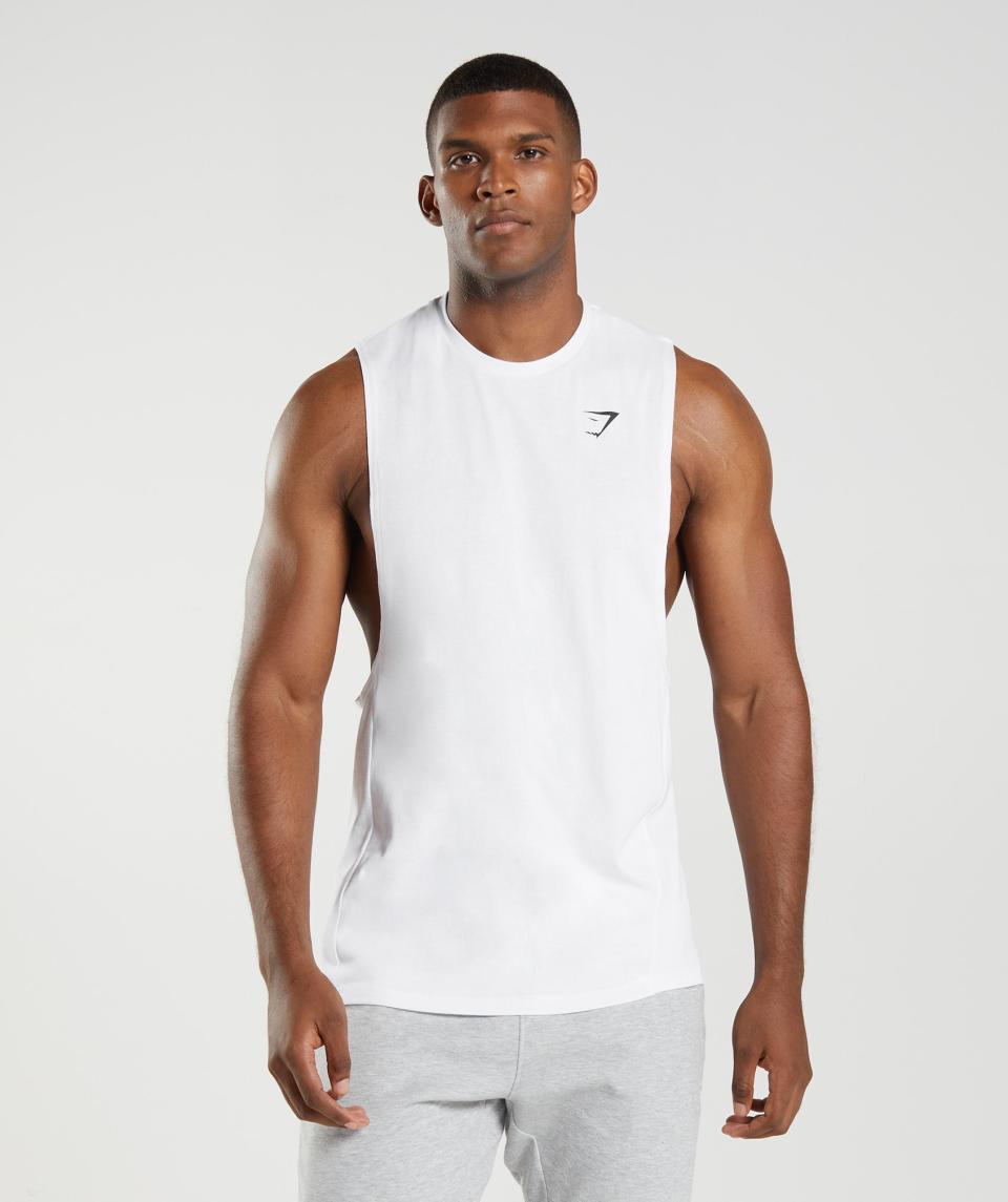 <p><a href="https://go.redirectingat.com?id=74968X1596630&url=https%3A%2F%2Fus.shop.gymshark.com%2Fproducts%2Fgymshark-react-drop-arm-tank-white-aw22&sref=https%3A%2F%2Fwww.menshealth.com%2Fstyle%2Fg25797535%2Fbest-workout-clothes-men%2F" rel="nofollow noopener" target="_blank" data-ylk="slk:Shop Now;elm:context_link;itc:0;sec:content-canvas" class="link ">Shop Now</a></p><p>React Drop Arm Tank</p><p>gymshark.com</p><p>$24.00</p>