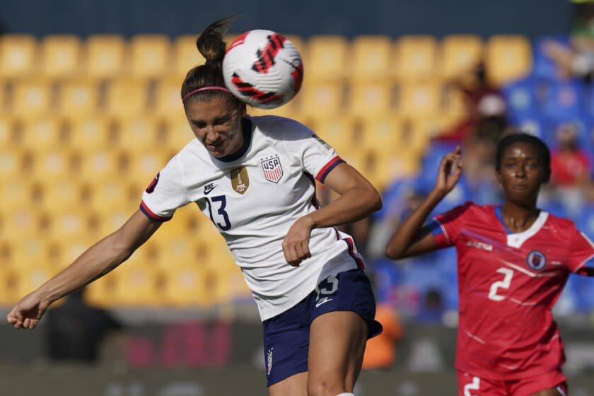 United States' Alex Morgan goes for a header during a CONCACAF Women'Championship soccer match against Haiti in Monterrey, Mexico, Monday, July 4, 2022. (AP Photo/Fernando Llano)