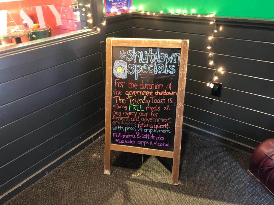 A sign seen outside The Friendly Toast, offering specials for those affected by the partial government shutdown in 2019.