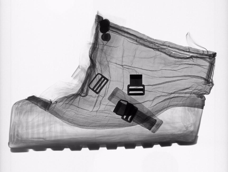 This handout image provided by the Smithsonian National Air and Space Museum shows an X-ray of an extravehicular (EV) overshoe that was designed to be worn over the Apollo spacesuit boots while an astronaut was walking on the Moon, part of a new art exhibit at the museum entitled: "Suited for Space,"opening Friday that highlights the creativity behind the suits that allowed humans to explore the moon and aspire to fly further from Earth. (AP Photo/Mark Avino, Smithsonian National Air and Space Museum)