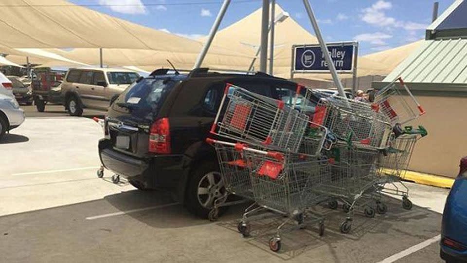 A number of trolleys were lined up alongside the driver's door along with a note calling them an 