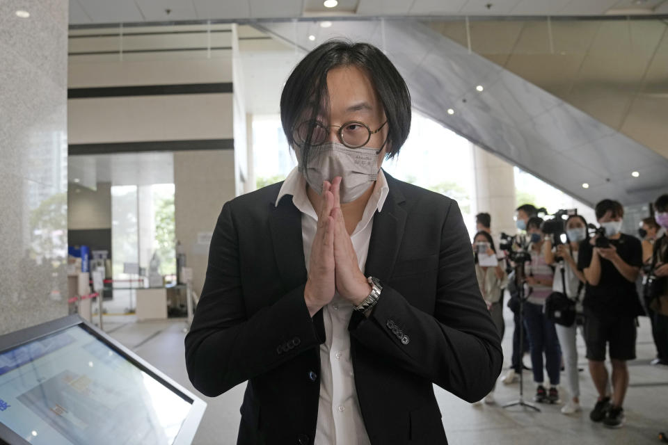 Mike Lam, one of the 47 pro-democracy defendants arrives a court in Hong Kong, Thursday, July 8, 2021. A court hearing for 47 pro-democracy activists charged with conspiracy to commit subversion under the security law over their involvement in an unofficial primary election last year that authorities said was a plot to paralyze Hong Kong's government. (AP Photo/Kin Cheung)