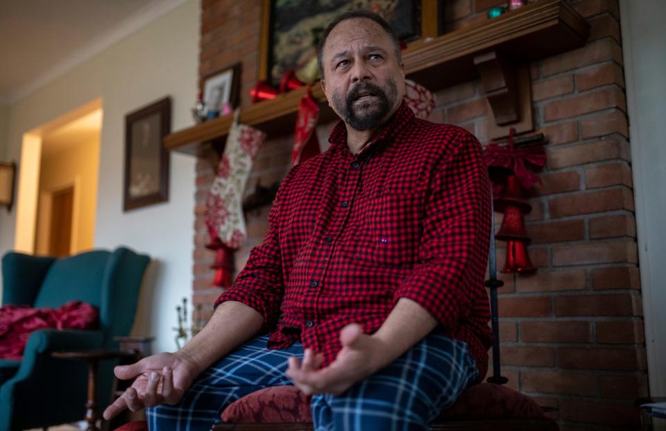 Marco Díaz-Muñoz, 64, an assistant professor at Michigan State University, sits inside his home in Lansing on Thursday, Feb. 16, 2023. Díaz-Muñoz was inside his classroom with his students when a gunman fired inside the class, killing Arielle Anderson and Alexandria Verner. 