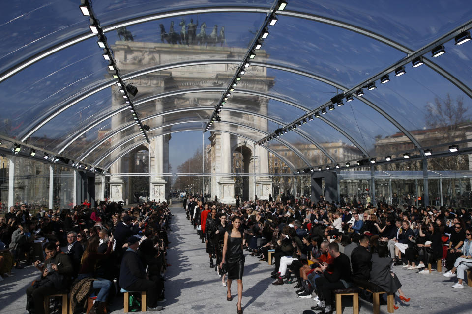 Models wear creations as part of the Bottega Veneta women's Fall-Winter 2019-2020 collection, that was presented in Milan, Italy, Thursday, Friday, Feb. 22, 2019. (AP Photo/Antonio Calanni)