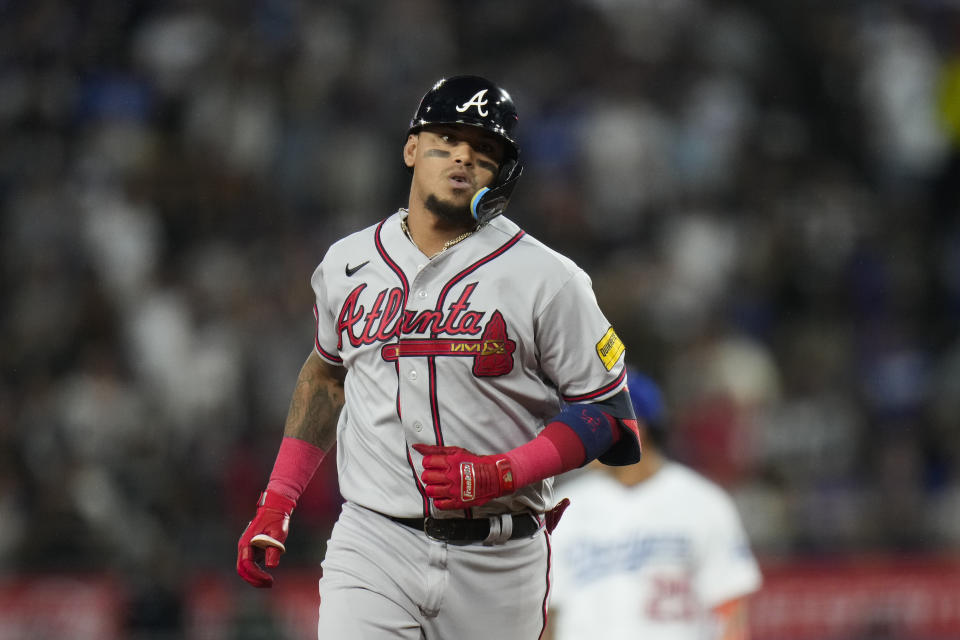 Atlanta Braves' Orlando Arcia runs the bases after hitting a three-run home run against the Los Angeles Dodgers during the 10th inning of a baseball game Saturday, Sept. 2, 2023, in Los Angeles. (AP Photo/Jae C. Hong)