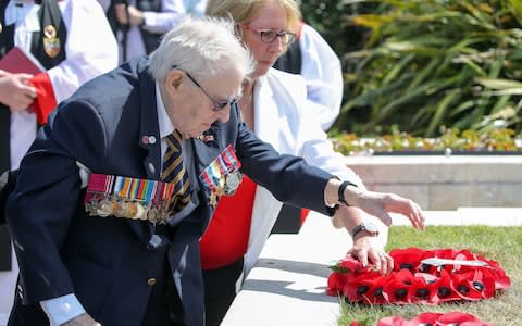 Jimmy Ockendon lays a wreath at the D-Day stone in Southsea - Credit: Andrew Matthews/PA