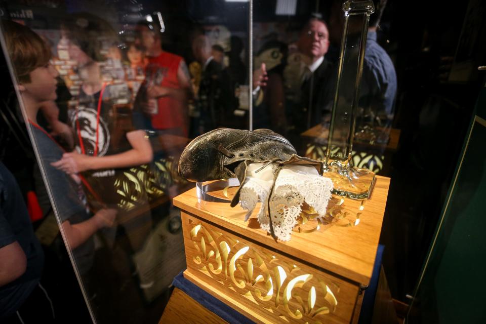 A temporary display houses the shoes of Louise "Luise" Kink at the Titanic Museum Attraction in Branson on Tuesday, June 6, 2023. Kink was one of 135 children aboard the Titanic on the evening of April 15, 1912 when it sank. Kink and her parents survived the fatal incident. Kink's shoes will be on display at the museum through the end of 2023.